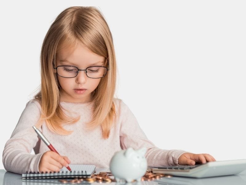 A girl reading and preparing her investment strategies.