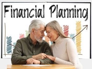 Financial Legacy : An elderly couple planning their financial future with a financial chart in the background, emphasizing long-term wealth management.