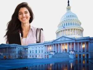 A smiling student holding books and a backpack, standing in front of the U.S. Capitol, representing student loan forgiveness opportunities in the U.S.